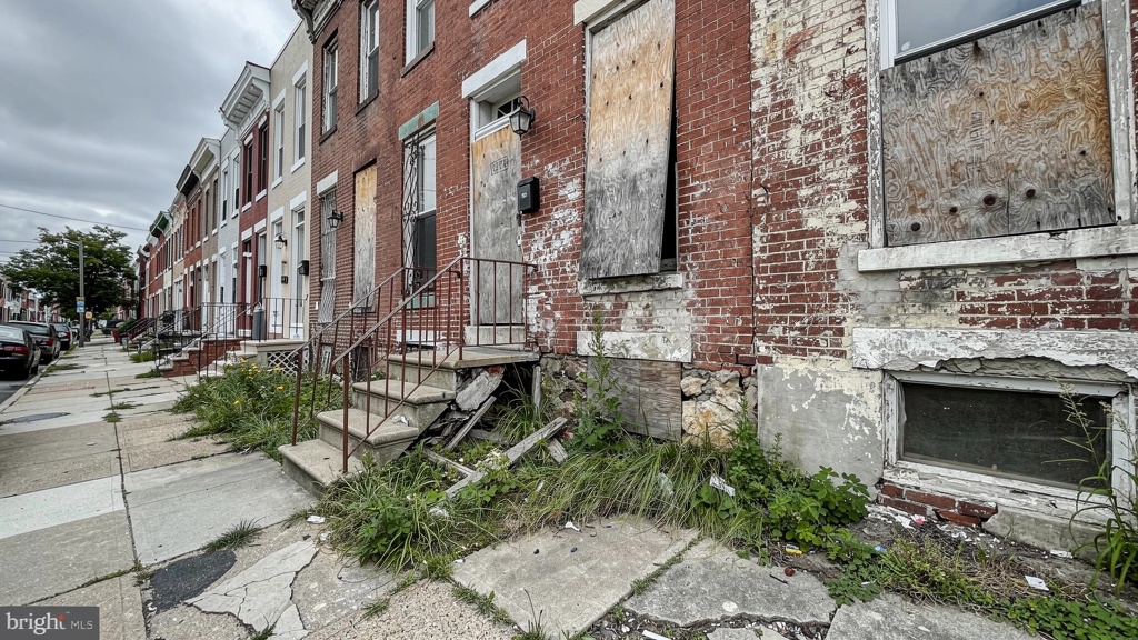 Philadelphia brick rowhome in need of renovation — an example of an inherited property whose assessed value significantly exceeded its true market value